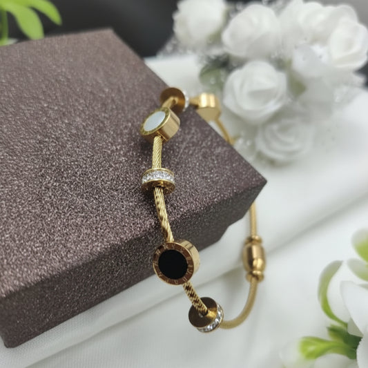 Anti tarnish gold charm bracelet - Black and White (SSB11)