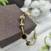 Anti tarnish gold charm bracelet - Black and White (SSB11)