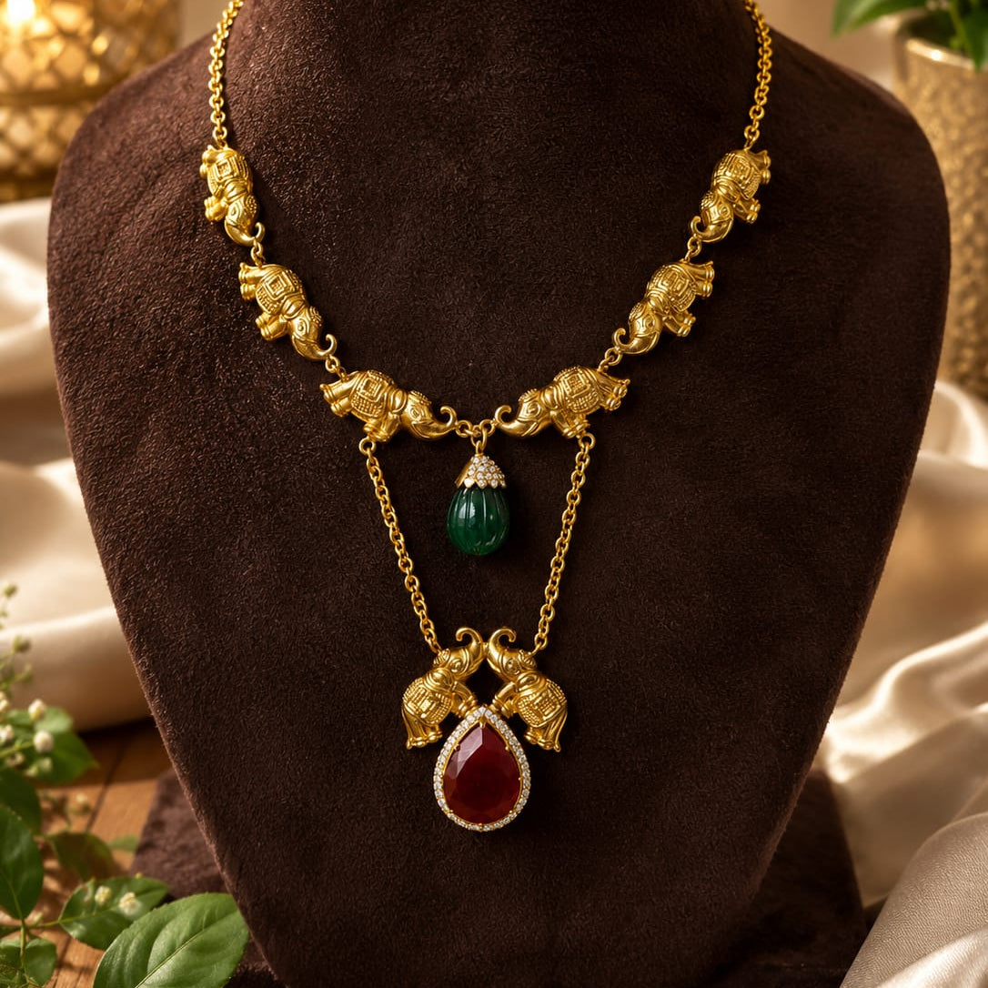 vintage royal elephant necklace with ruby earrings