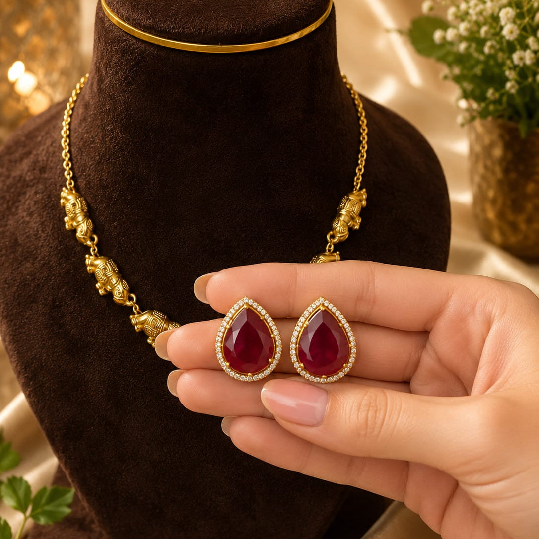 vintage royal elephant necklace with ruby earrings