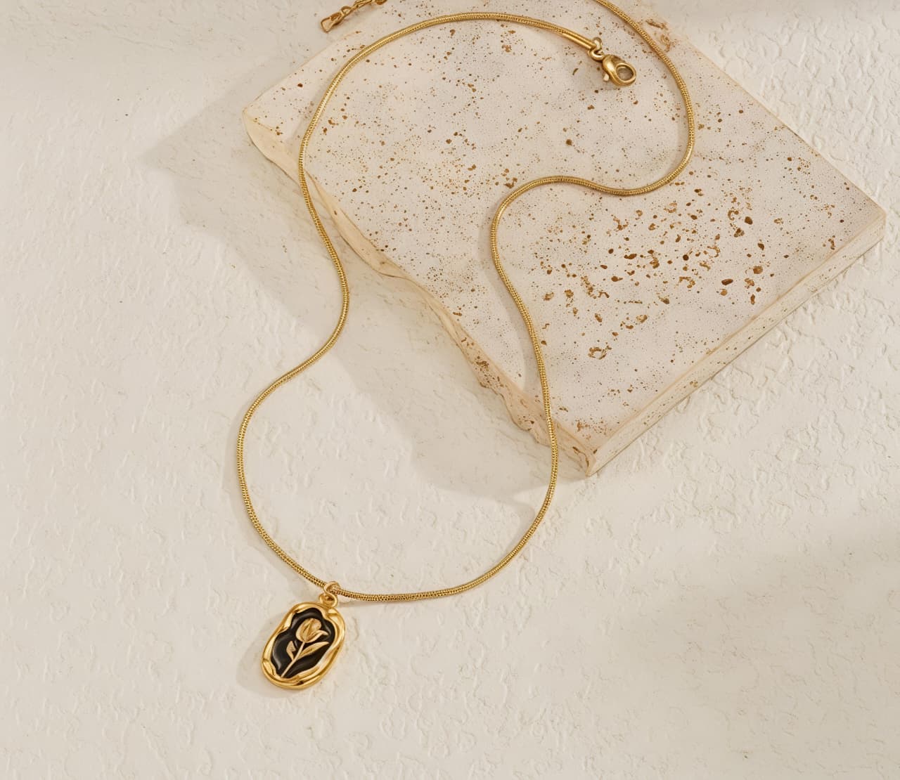 ebon bloom – waterproof floral pendant necklace