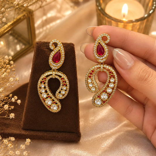 Ruby earrings, Kundan earrings, statement earrings, gold-plated earrings, festive jewellery, wedding earrings, ethnic earrings for women, bridal jewellery, designer drop earrings, party wear earrings, traditional Indian jewellery.